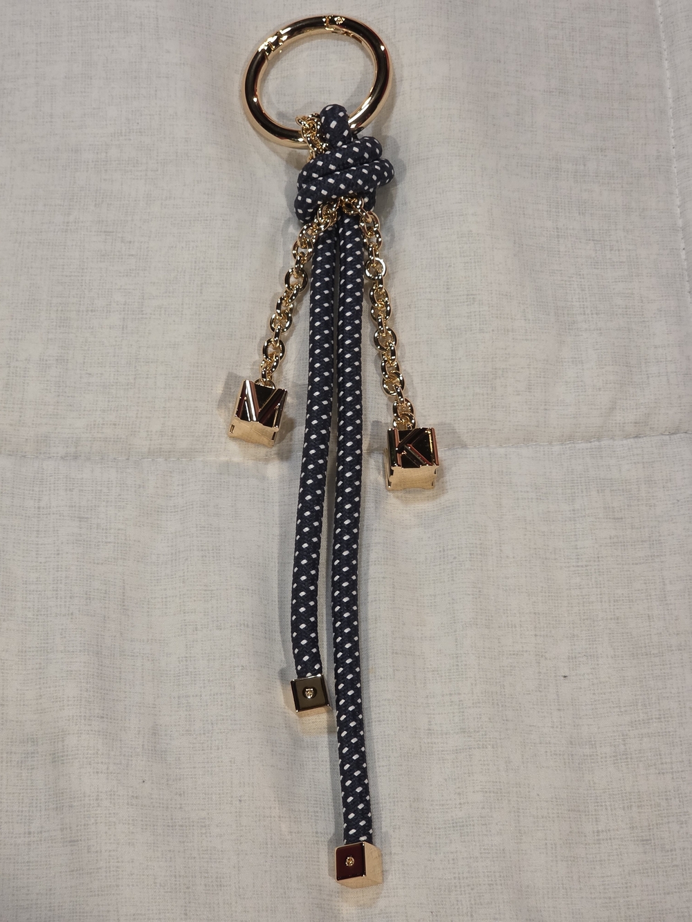 Michael Kors Gold Ring Keychain with Navy Polka-Dot Tassels